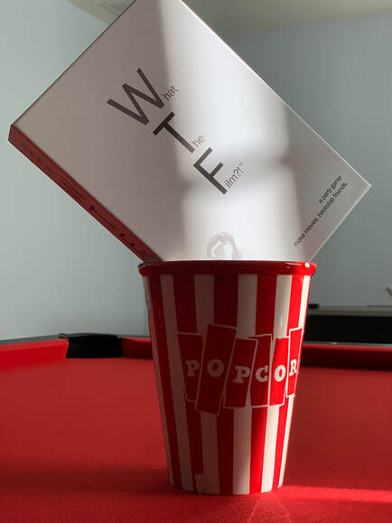 https://www.lethalchickengames.com/uploads/9/7/4/2/9742556/published/what-the-film-party-game-in-popcorn-can.jpg?1686816345